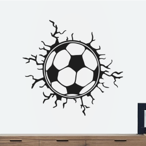 Voetbal door de muur